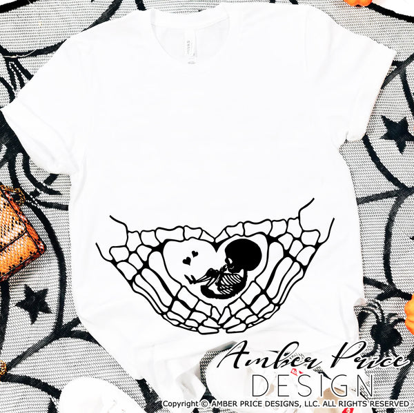 Halloween Pregnancy SVG, Skeleton Hands with baby Cute Fall Pregnancy SVG, Fall Maternity SVG files,, Twin Pregnancy SVG reveal Shirt for fall, Fall Autumn Maternity SVG Cricut SVG Silhouette SVG SVG Files for Cricut, Cricut Projects Cricut Project Ideas Simply Crafty SVG Bundles for Cricut, SVG Design Bundles Vectors | Amber Price Design